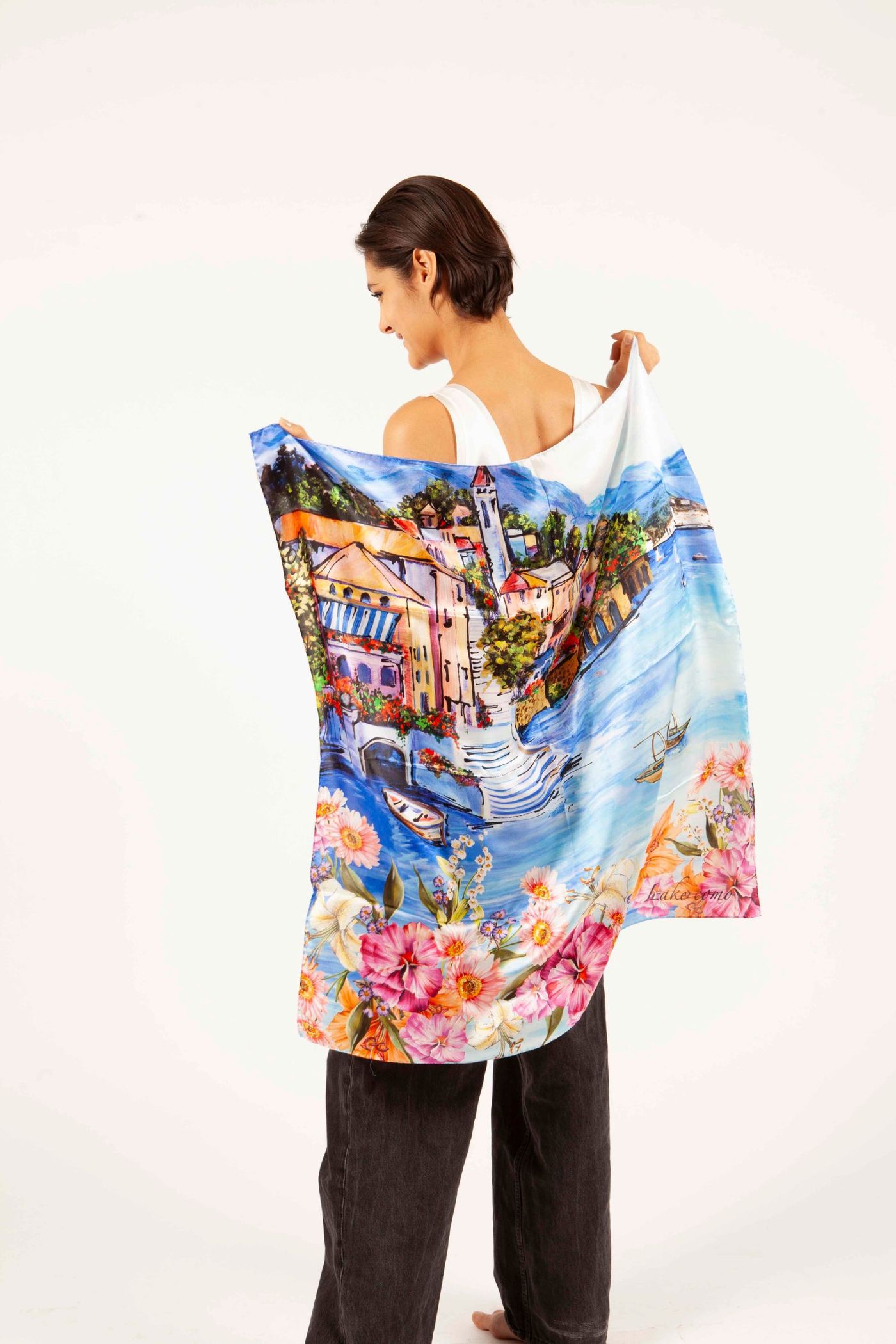 Silk scarf painted with Lake Como, held open